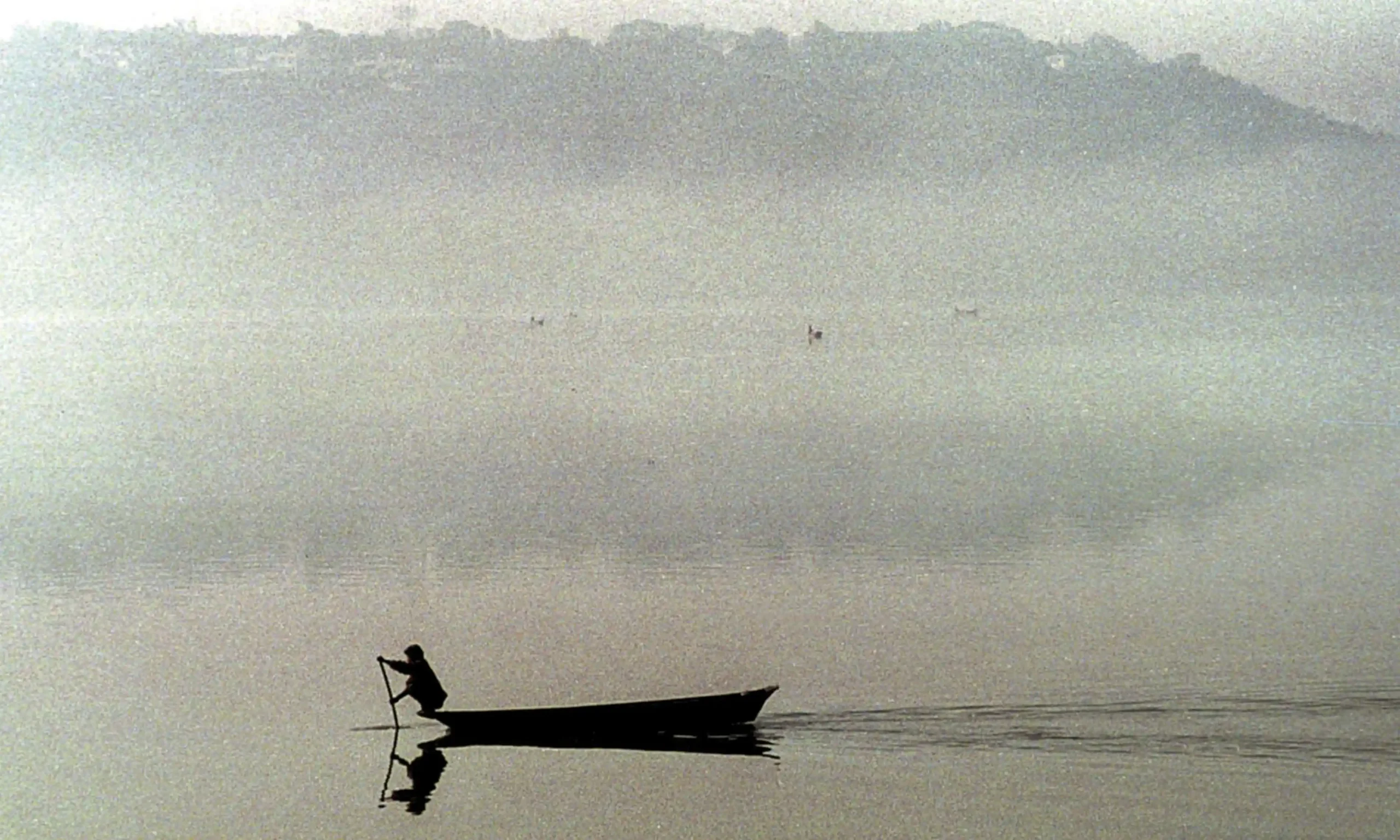 ‘But the lake looks endless. / And my boat’s increasingly but a slowish swimmer.’ Photograph: EPA